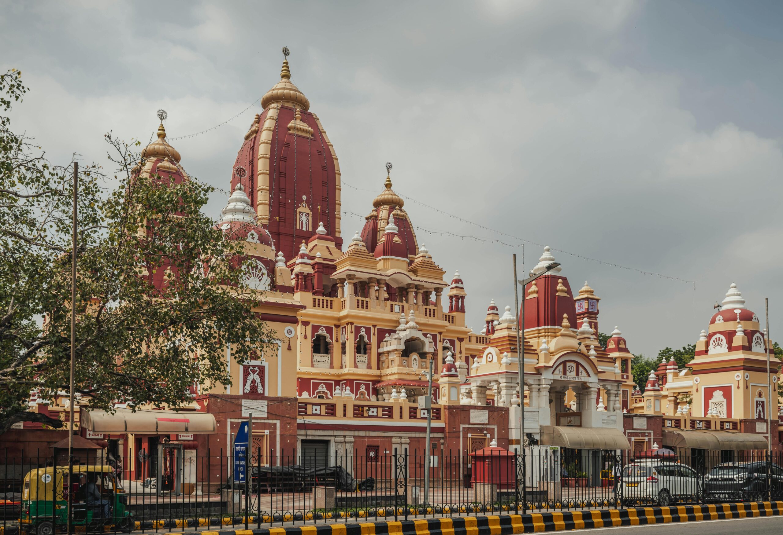 Stunning view of Birla Mandir Temple, New Delhi with beautiful architecture under cloudy skies.